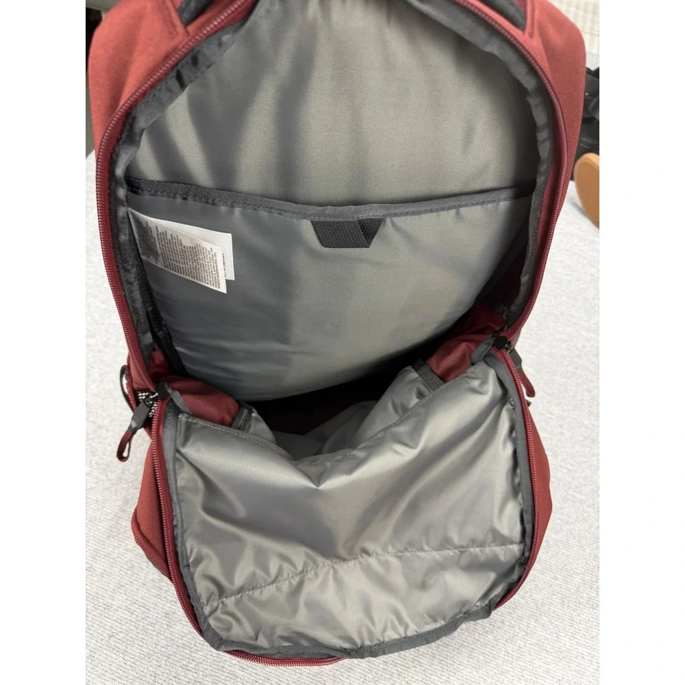 The North Face strap buckle zip